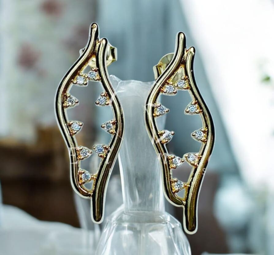 Brinco curvas folheado à ouro