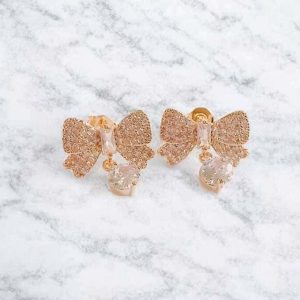 Brinco laço com zircônias folheado à ouro