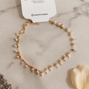 Pulseira micro pérolas folheado à ouro