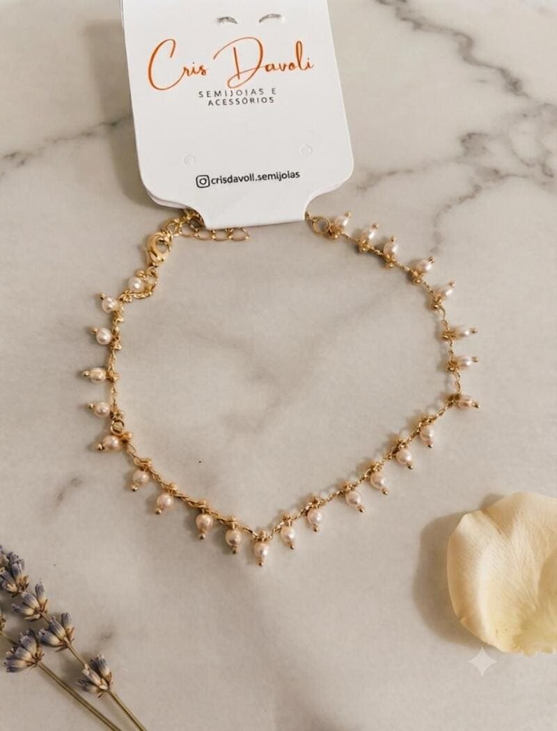 Pulseira micro pérolas folheado à ouro